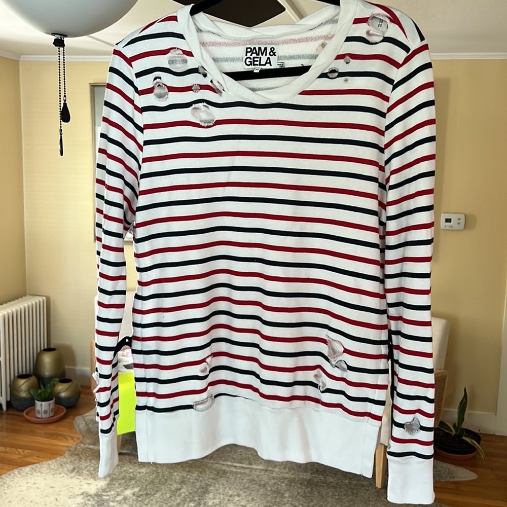 Distressed sweater. Size medium. Red, White & Blue.